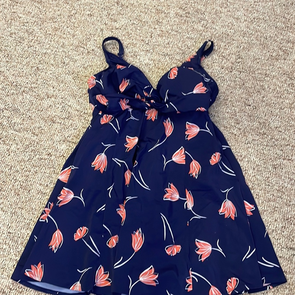 One piece swimsuit with skirt in navy with peach tulips